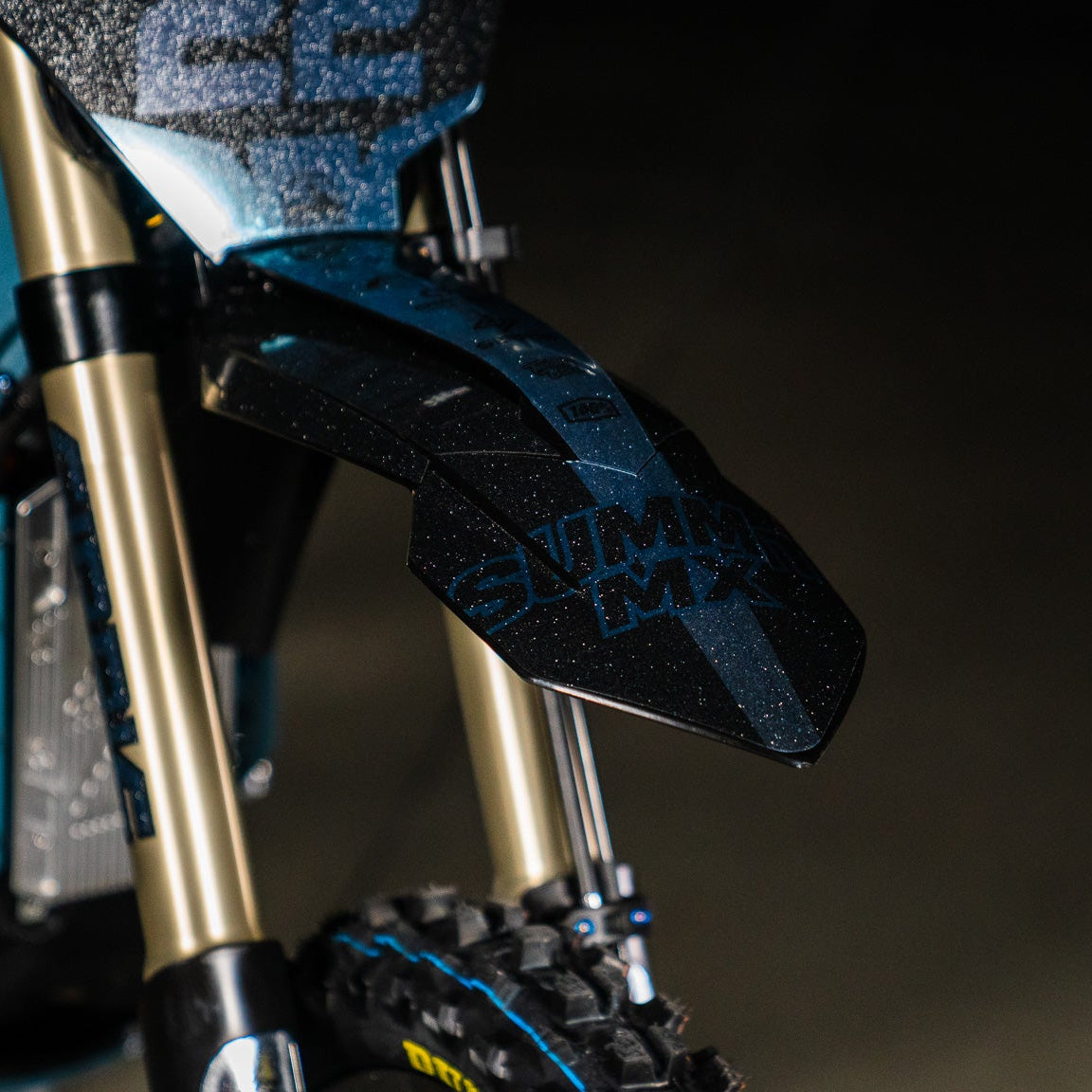 KTM 85 front fender decal installed on blue dirt bike with gold forks