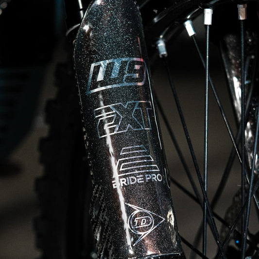 EXT Ferro fork tube decal sparkle finish installed on suspension fork