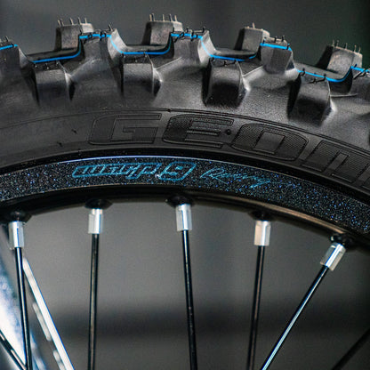 Warp 9 rim decals installed on motocross wheel