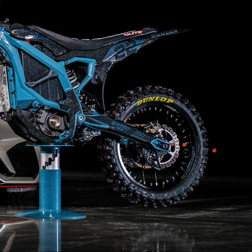 Surron Ultra Bee swing arm decal installed on electric motocross bike