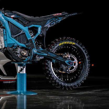 Surron Ultra Bee swing arm decal installed on electric motocross bike