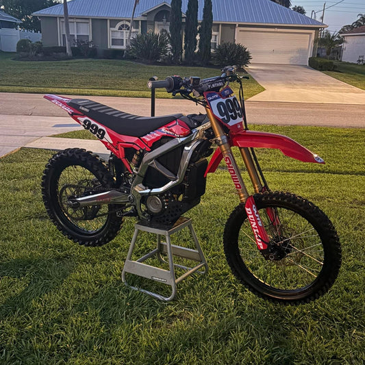 Installed on red Surron Ultra Bee e-moto