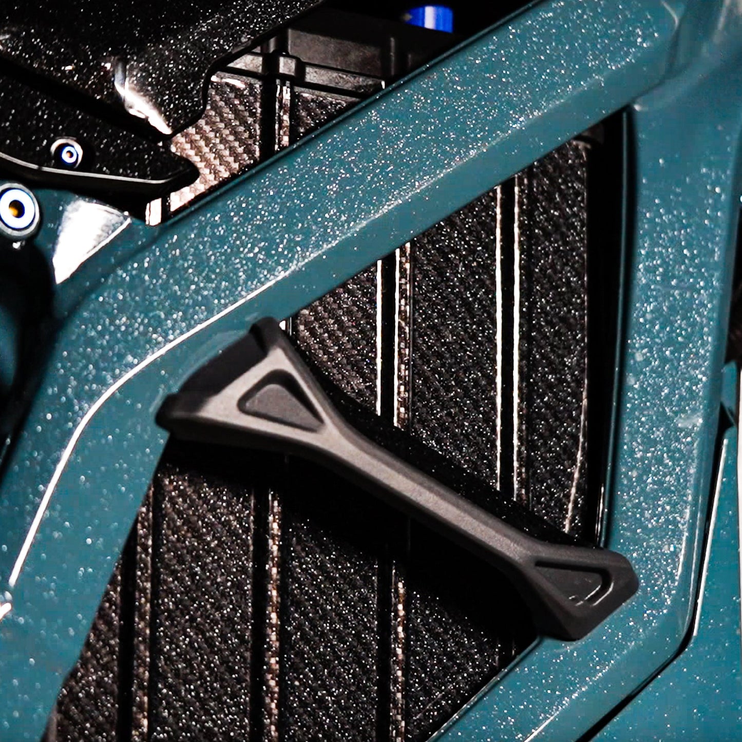 Installed on Surron Ultra Bee e-moto battery enclosure