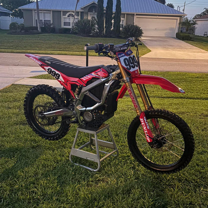 Installed on red Surron Ultra Bee e-moto