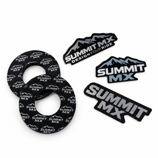 Summit MX Brand Pack with a pair of black Summit MX grip donuts and three Summit MX logo stickers in assorted finishes